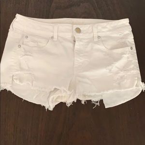 Distressed white American Eagle Shorts